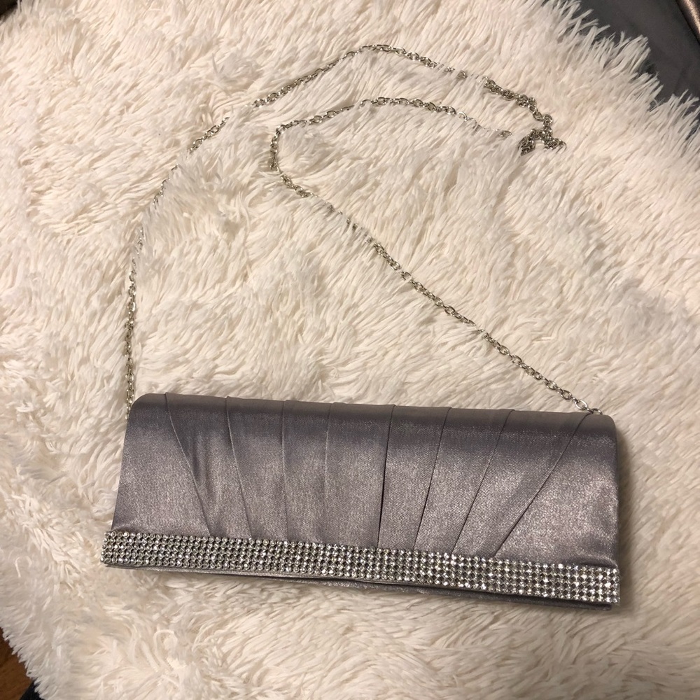 Clutch with shoulder strap